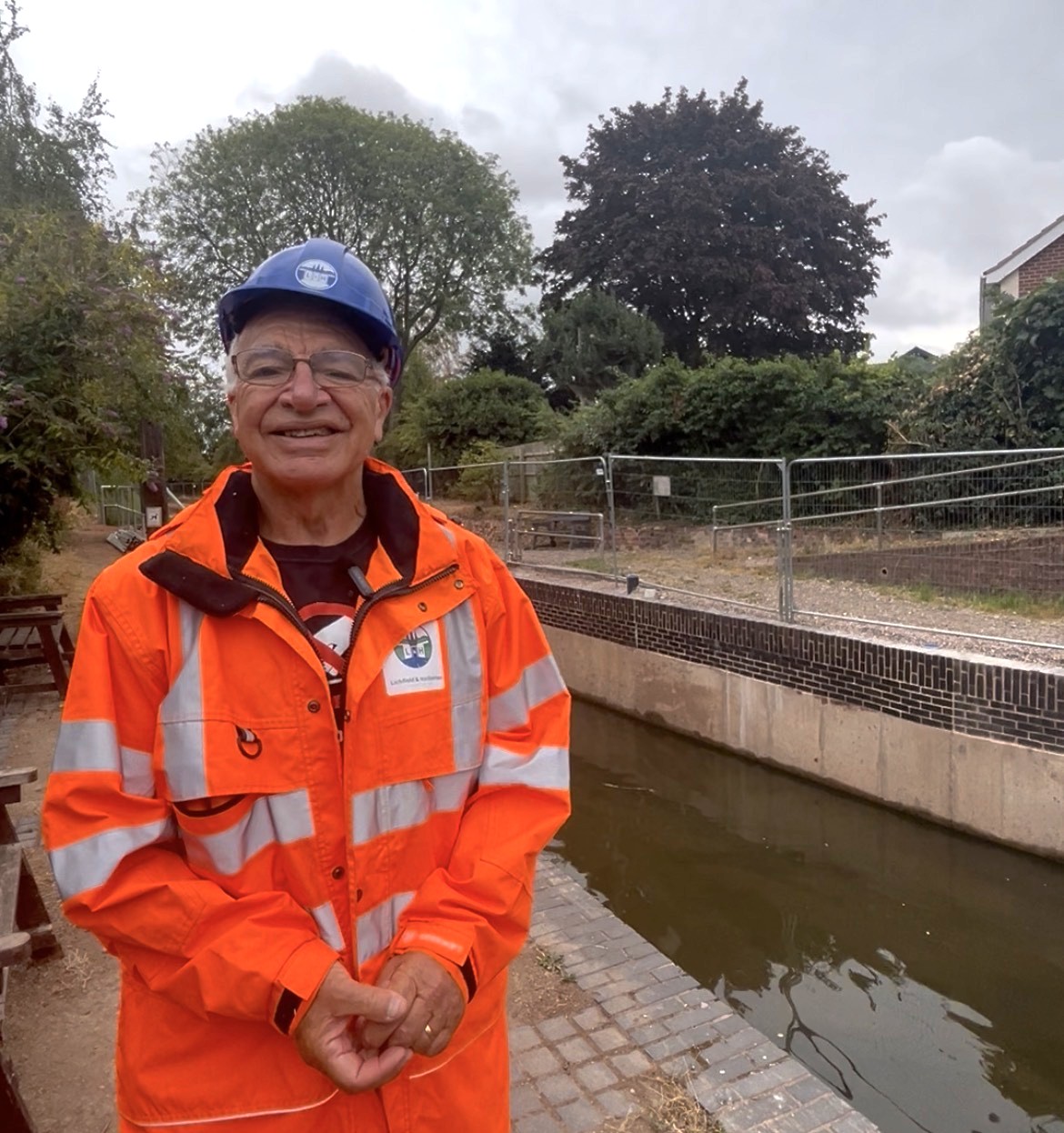 Derek Lord beside the restored Gallows Reach section of the Lichfield Canal